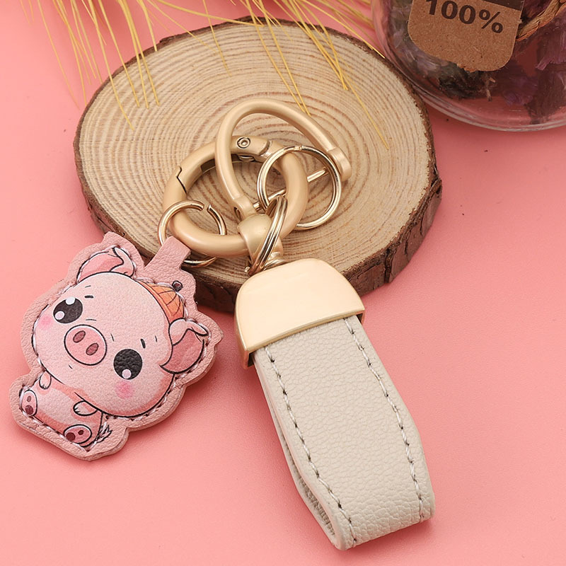 Nuevo llavero de piel de cordero francés pequeño llavero fresco colgante mini bolso corto colgante pequeño joyería