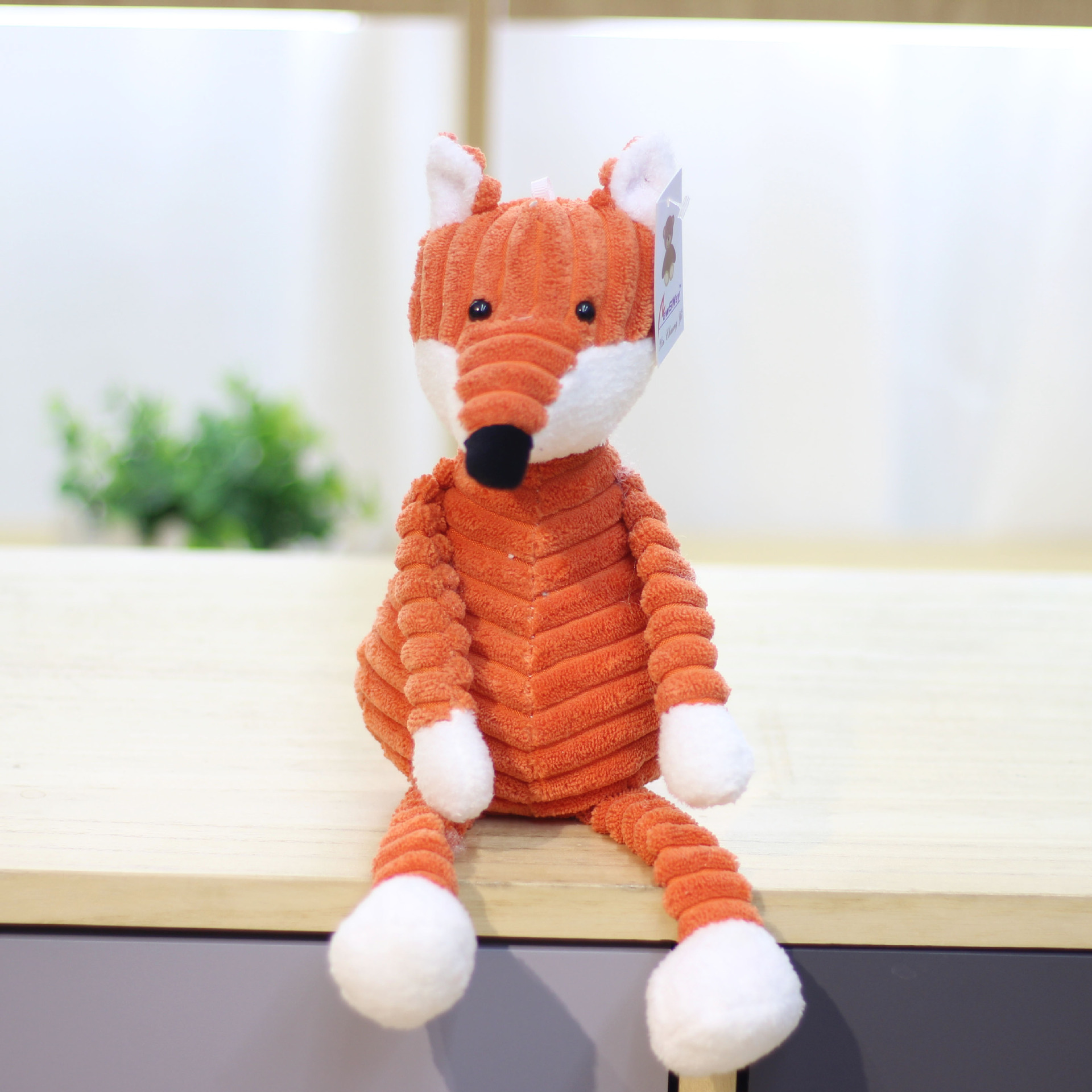 Fuente de la fábrica a rayas animal felpa muñeca de juguete creativo animal muñeca grab máquina muñeca al por mayor accesorios de ropa