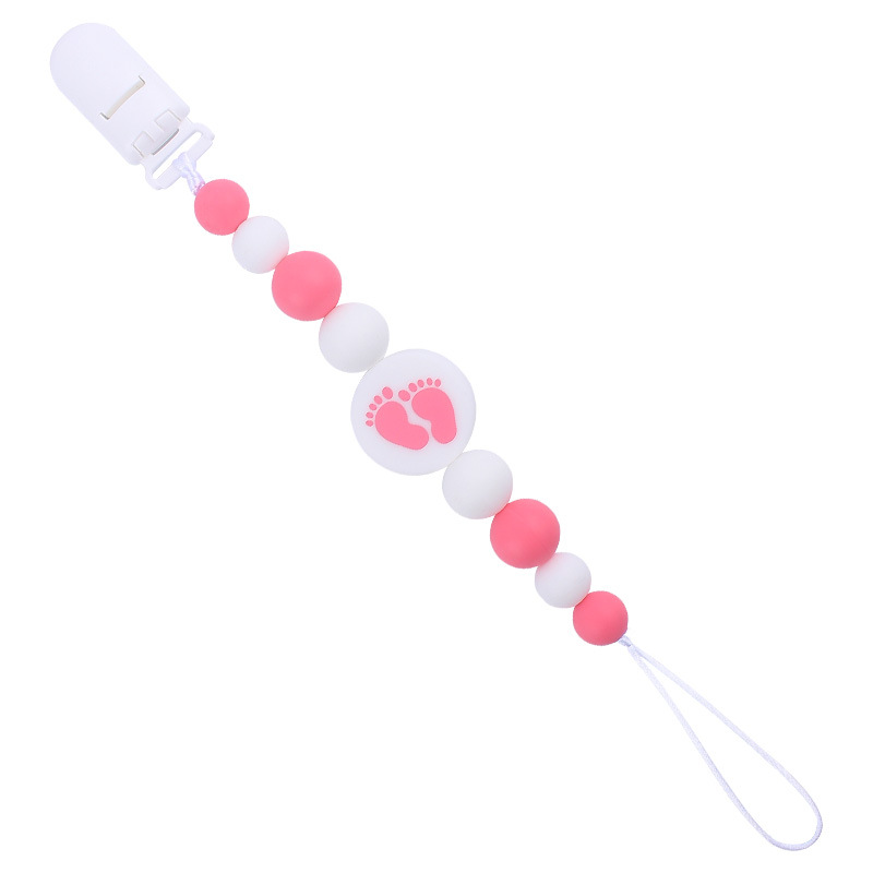 Nuevo bebé suministros de dibujos animados de impresión redonda amor creativo DIY silicona mordedura molar pezón cadena anti-caída