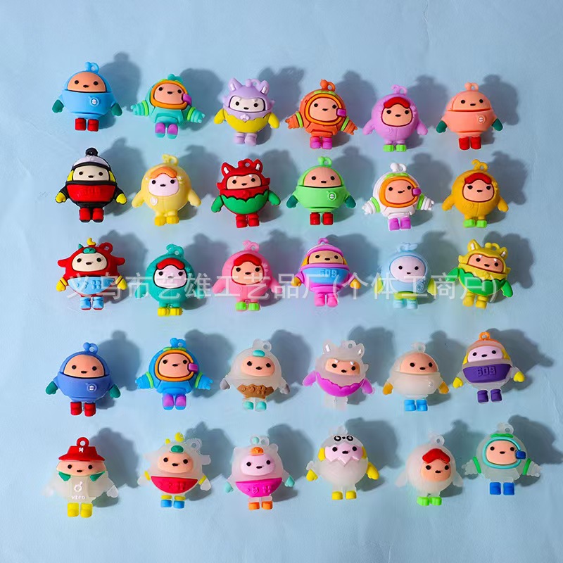 Nuevo estilo de dibujos animados de PVC huevo llavero de fiesta muñeca pequeña decoración creativa pegamento suave adorable colgante al por mayor