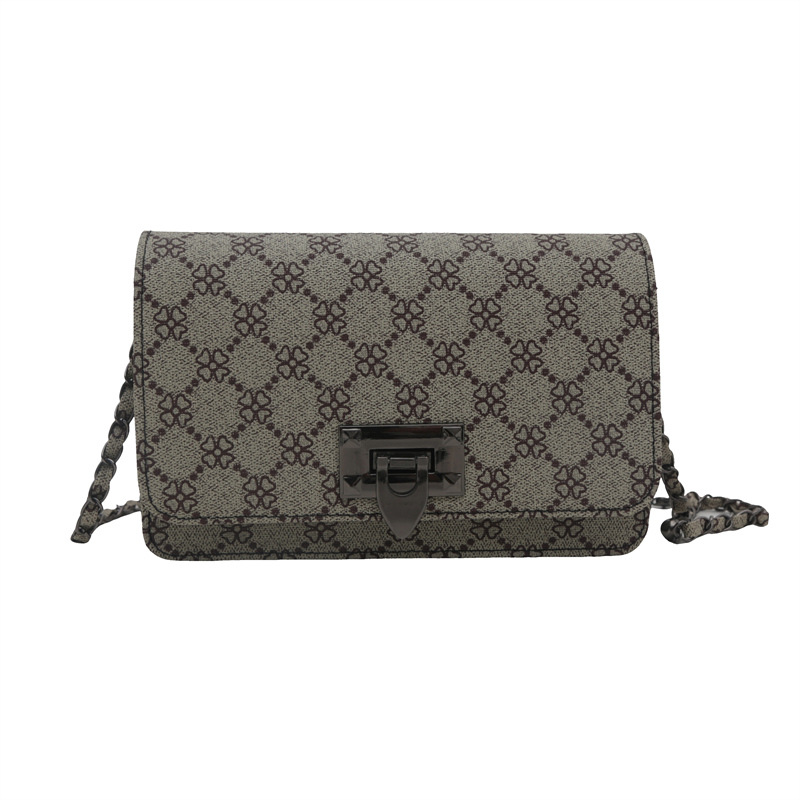 2024 nuevo bolso de mujer transfronterizo portátil retro cadena leopardo bolso de nicho diseño personalidad bolso de mochila