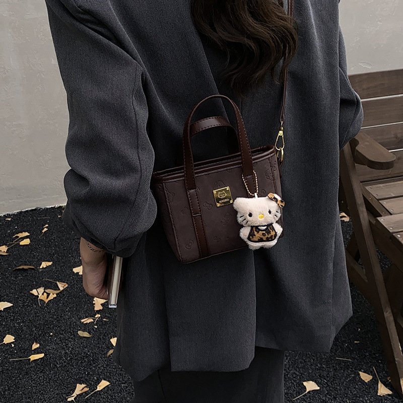 2025 otoño y invierno nuevo estilo simple de gran capacidad bolso de cubo portátil de mujer sensación de alta calidad bolsa de hombro casual bolsa de viaje mochila