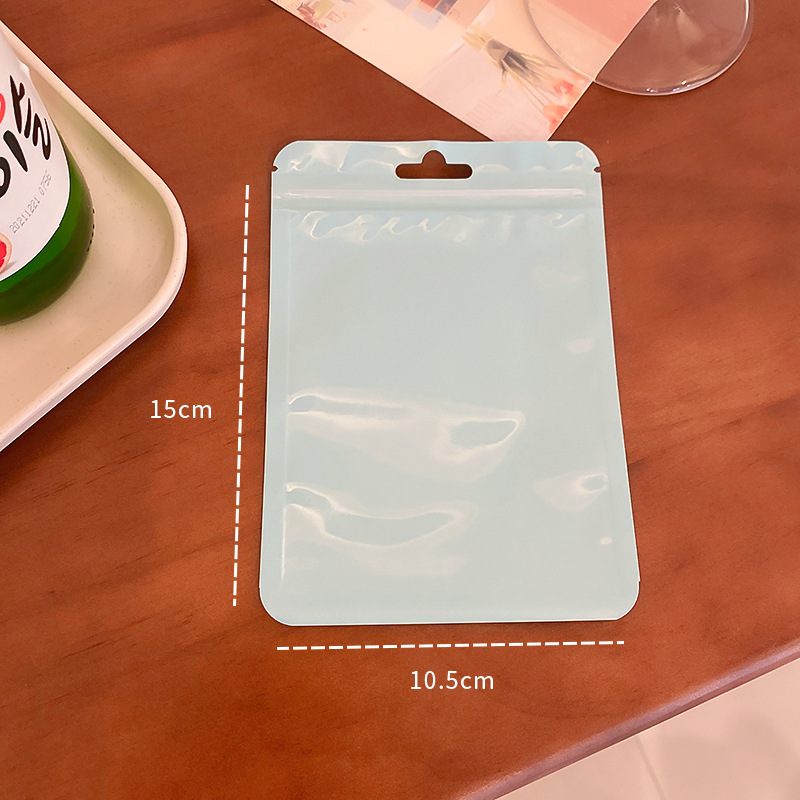Macaron color bolsa de autosellado bolsa de plástico engrosada transparente color hueso bolsa de almacenamiento sellado bolsillo maquillaje cepillo bolsa de embalaje