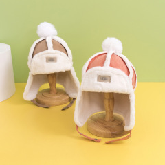 Small leather label velvet children's Lei Feng hat winter new warm children's hat ear protection simple children's hat 1-3 years old