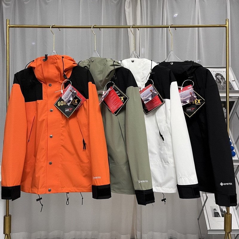 Cross-Border Outdoor Jacket for Men and Women, Color-Blocking Waterproof Hooded Mountaineering Jacket, Original Label Embroidered Windbreaker 1990 Cross-Border Outdoor Jacket for Men and Women, Color-Blocking Waterproof Hooded Mountaineering Jacket, Original Label Embroidered Windbreaker 1990