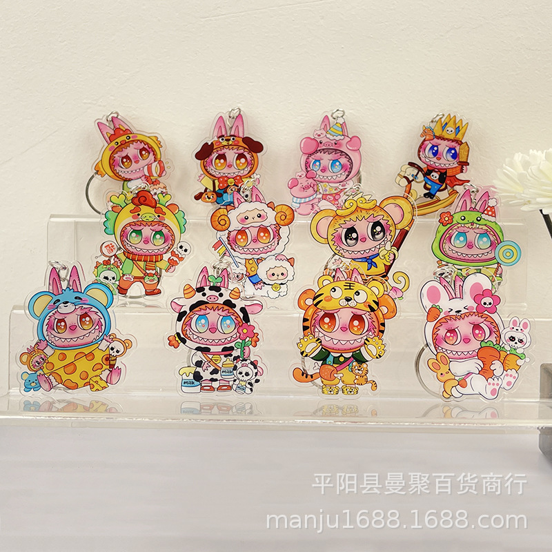 布のアクリルのキーホルダーのオーダーメードのアクリルの周辺のlabubuのカップルはdiyの部品を掛けます。