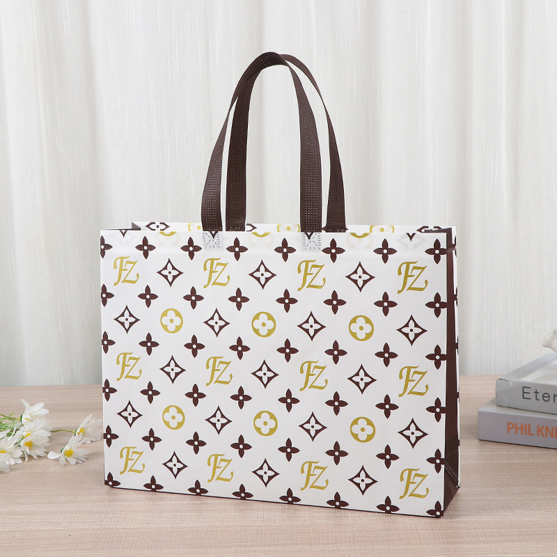 Bolsa de compras de ropa no tejida impresión creativa almacenamiento bolsas de tela no tejida al por mayor bolsas de mano de gran capacidad cubiertas por película tridimensional