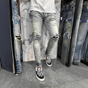 Manufacturers European and American High Street Fake Ripped Jeans Men's and Women's Old light blue Patch Micro-elastic Slim Fit Leggings Trendy Trousers