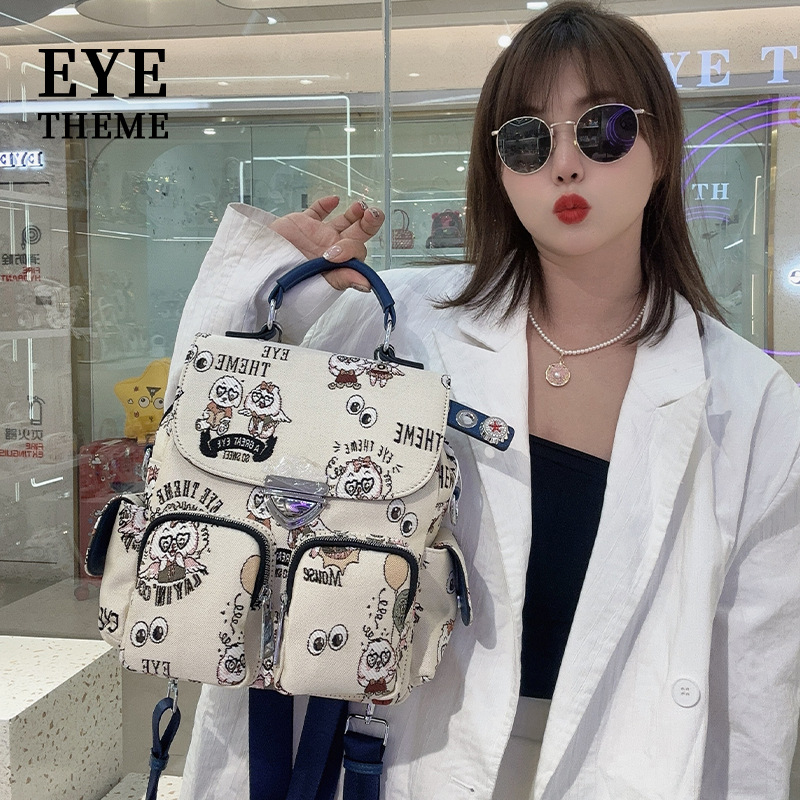 Colores contrastantes, nueva impresión de personalidad, extraña bolsa de mujer portátil con tapa de flip, novedad, lindo hombro de hombro con una gran capacidad.