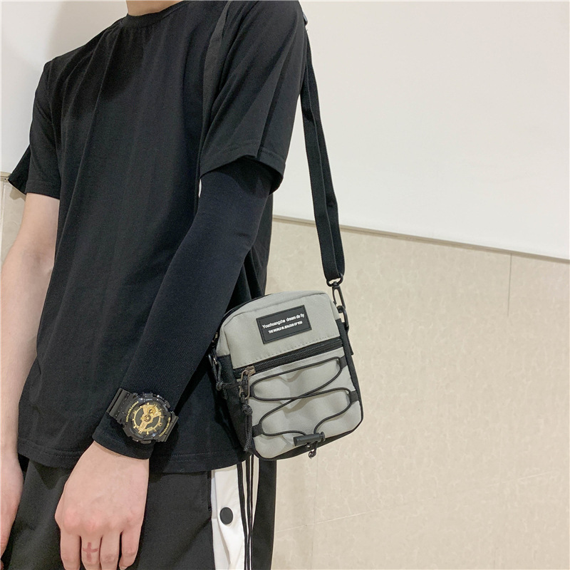 67g Weight Zipper Closure Type Single Shoulder Strap Strap Type Crossbody Bag Bags Type Nylon Material Letter Pattern Streetwear Style Square Shape Khaki, Light Grey, White, Black Color Small Size Small Nylon Letter Streetwear Square Zipper Crossbody Bag 56