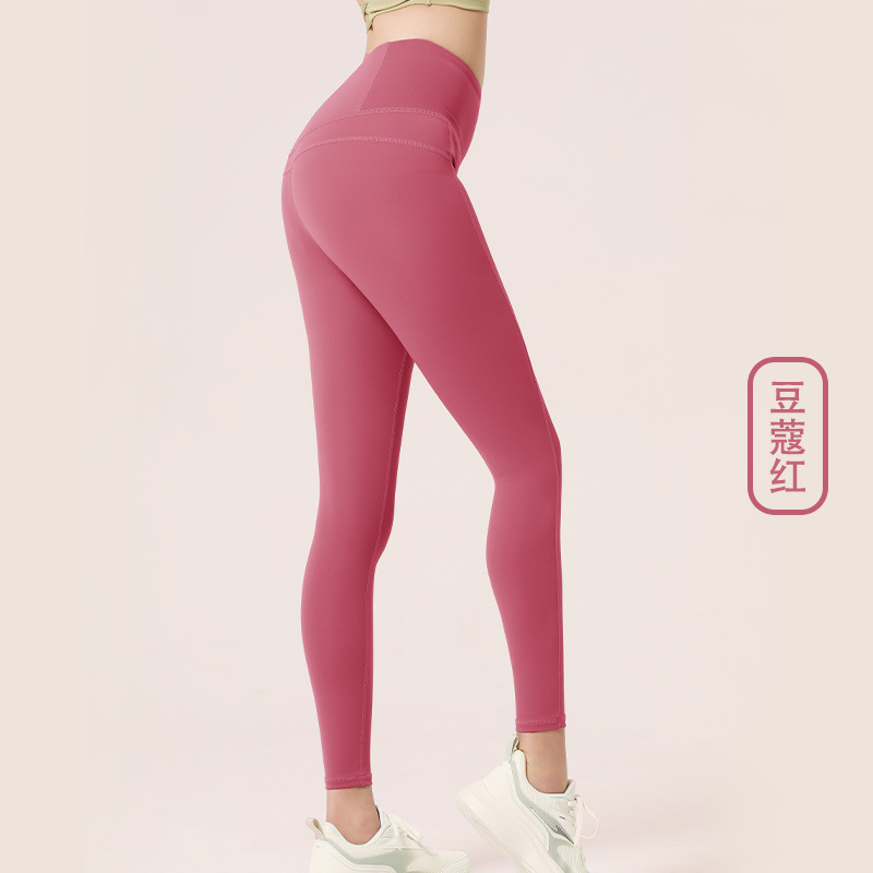 Juyitang europeo y americano desnudo melocotón verano fitness Pantalones mujer apretado cintura alta cadera elevación estiramiento correr deportes yoga Pantalones