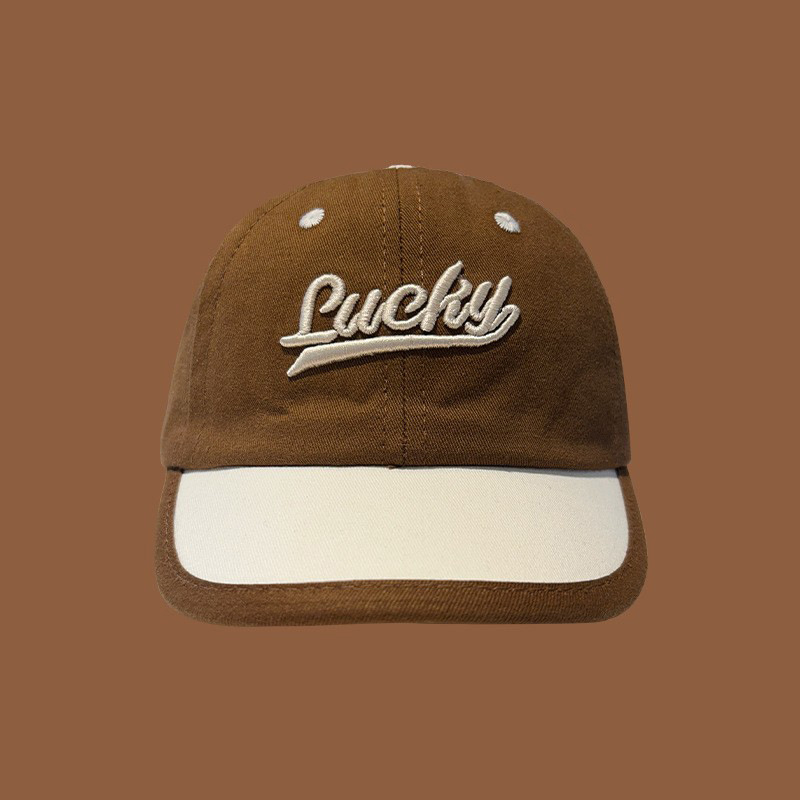 Sombrero de bebé primavera y otoño letras extranjeras sombrero de lengua de pato para niños otoño y invierno caliente sombrero de sol bebé marea de béisbol