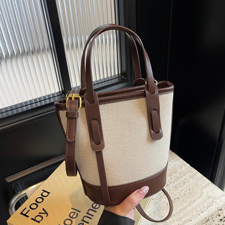 Bolsa de balde de color de contraste popular de este año 2026 nuevo bolso de hombro universal bolso de viaje simple de alta calidad
