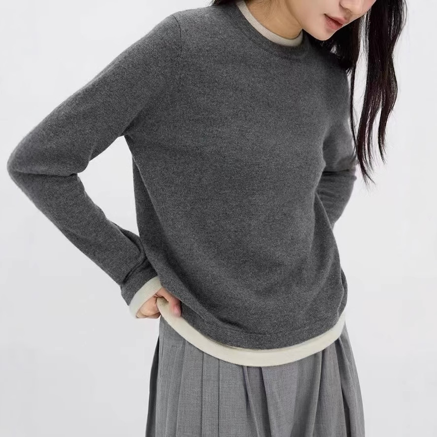 色の偽の2つの丸首のカシミヤのニットの底のシャツの女性の秋冬の怠惰な高級感の灰色のセーターの中で上着を掛けます。