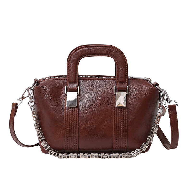 Bolso de mujer de moda bolso de mensajero de textura de color sólido 2025 otoño e invierno nuevo bolso de viajero simple bolso de mano