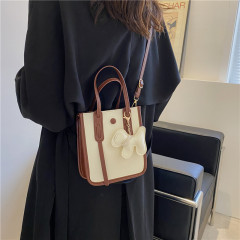 2022新款氣質女秋季韓版斜挎包時尚簡約百搭手提包狗狗掛件單肩包