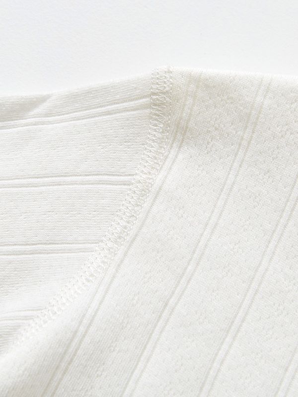 Conjunto de ropa interior para niños para primavera, otoño e invierno, ropa sin costuras de algodón puro para niños y niñas, estilos finos separados, camisetas y pantalones térmicos para bebés.