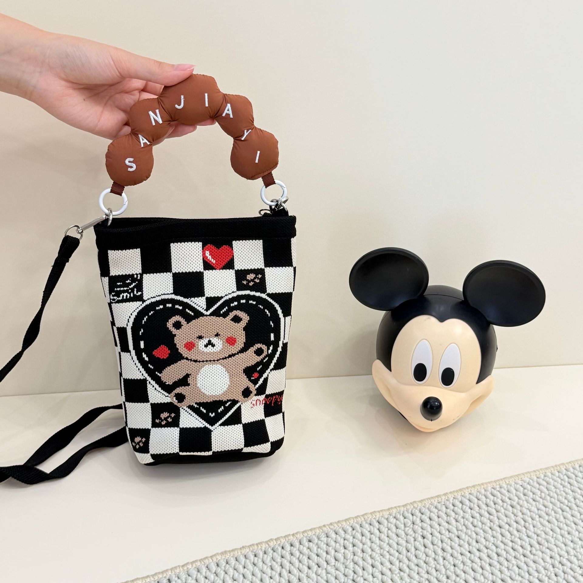 2026 primavera y verano nuevo bolso de cubo de pintura creativo portátil gran espacio de aire de dopamina alta sensación mochila