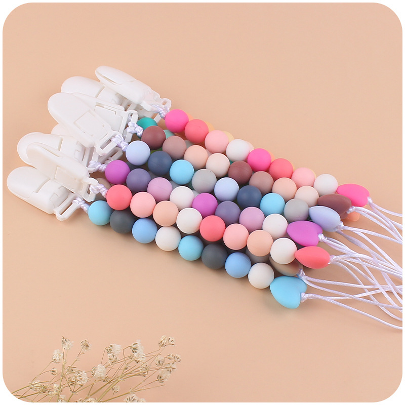 Bebé suministros chupete cadena creativa de dibujos animados amor cuentas de silicona mordedura cadena anti-gota molar Nuevo