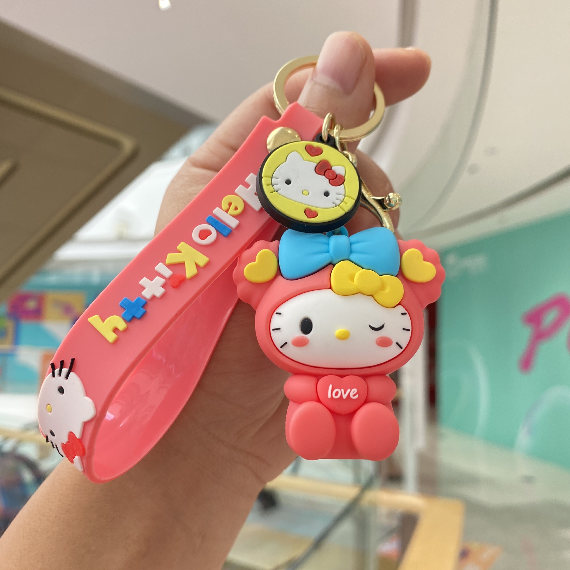 Arco KT gato llavero lindo muñeca de dibujos animados estudiante mochila colgante coche pequeño regalo al por mayor