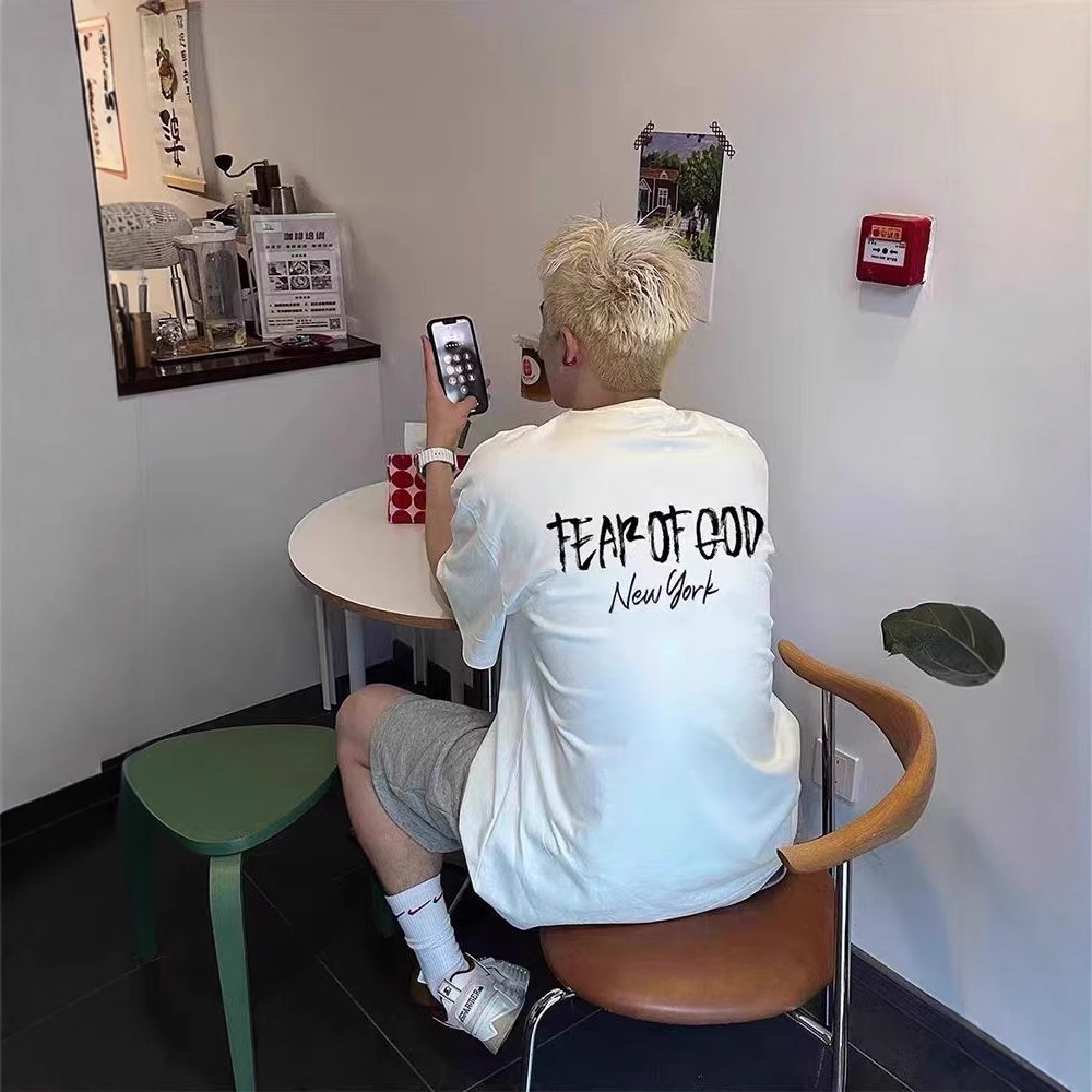 新型エッセンティルスのプリントのアルファベットのゆったりした丸首の高い街のアメリカのファッションのブランドの男女のカップルの半袖のtシャツ