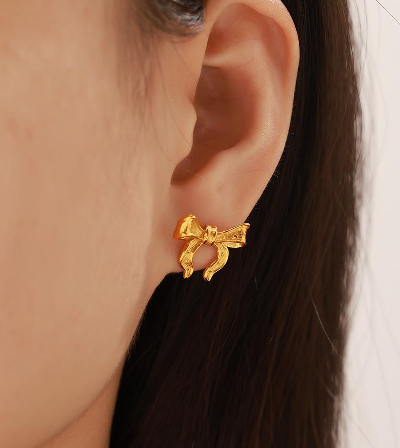 Set de joyería para mujer con colgante de lazo en acero_voghion.com