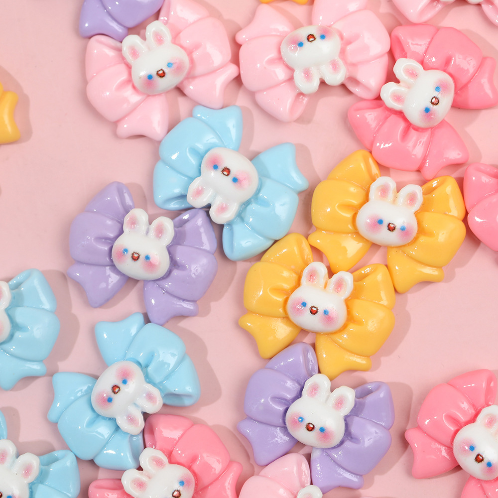 Dibujos animados macaron mariposa conejo resina accesorios DIY crema pegamento horquilla accesorios para el cabello teléfono móvil Shell material hecho a mano al por mayor