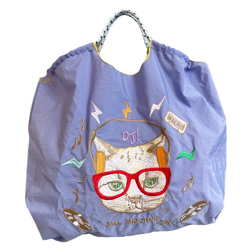 Bordado de diez mil agujas 2024 Bordado de diseño de nicho japonés Bordado de protección del medio ambiente Bolso de compras de nailon Bolso de mano