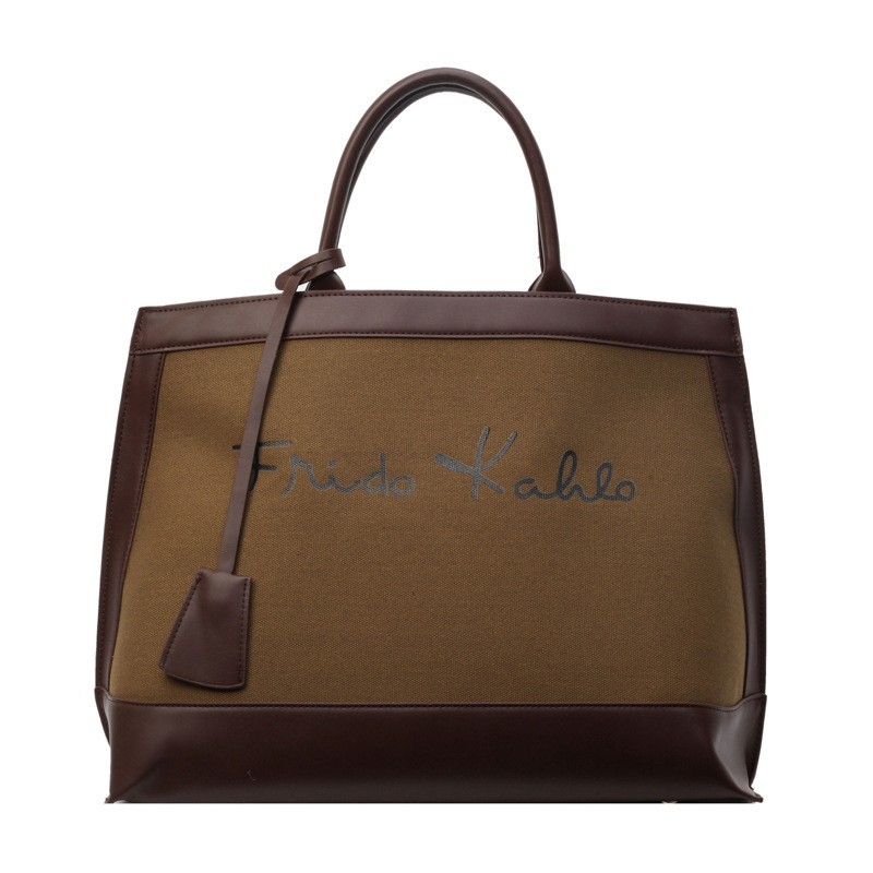 Bolso portátil retro de alta gama de gran capacidad para mujer 2024 nuevo estilo de moda lona contraste color viajero bolso de un solo hombro