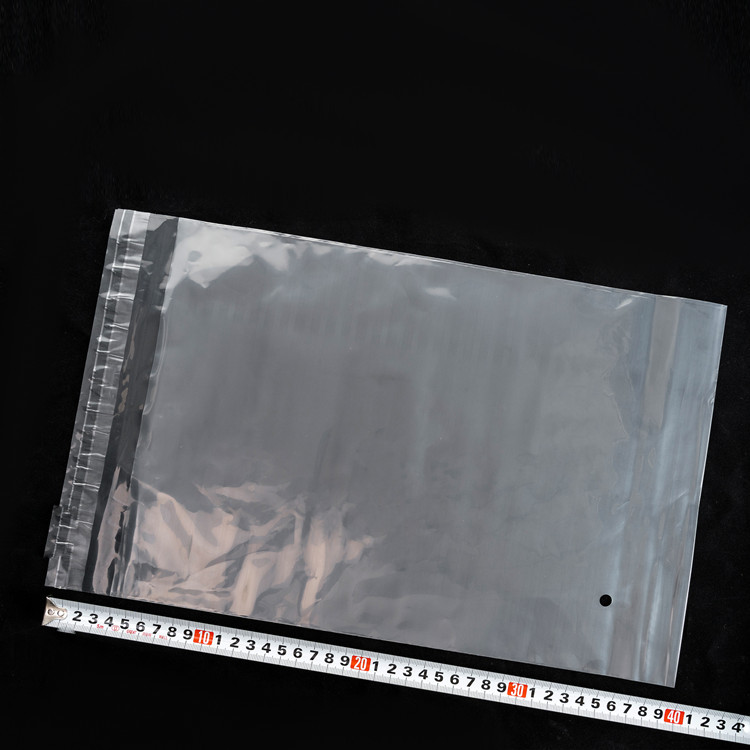 批發45*50雙層8絲10絲警告語PE不乾膠自粘袋透明袋100個1包