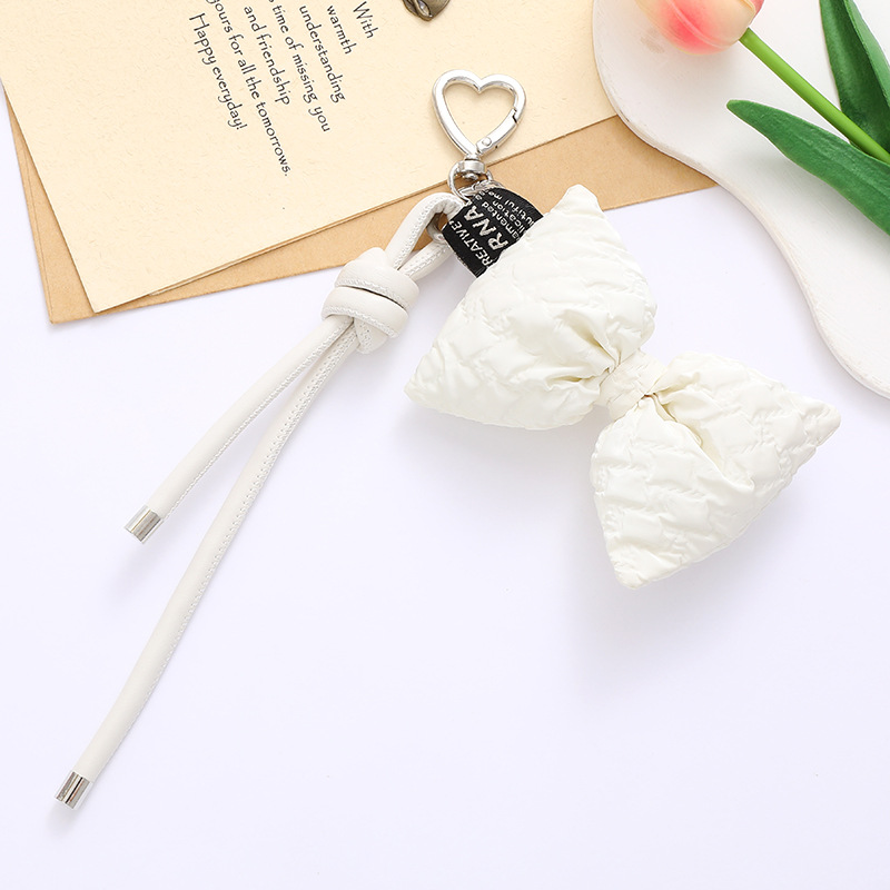 Nuevo tipo de cuerdas de cuero PU llavero colgante in bolsos de moda colgante cadena accesorios DIY tejido a mano