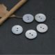 In stock natural environmental protection boutique black butterfly flat two-eye high-end suit shirt cardigan jewelry shell button button button