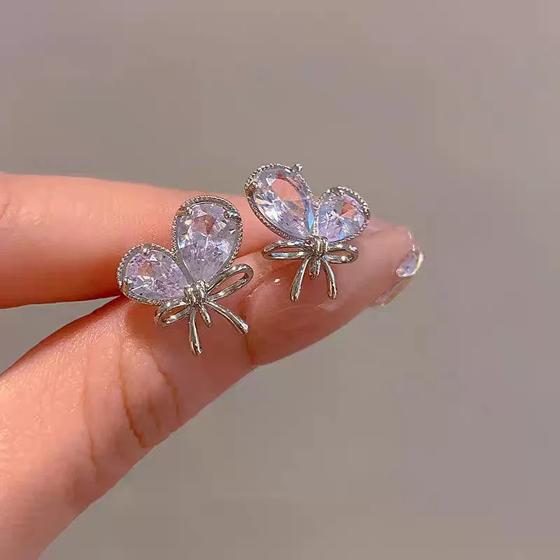 Универсальные небольшие голубые серьги с бантиком и zircone, стиль светлый люкс, стиль высокого качества