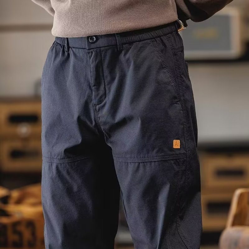 Multi-Bolsillo overoles hombres marca de moda japonesa más el tamaño de los pantalones sueltos atados al tobillo de primavera y otoño pantalones casuales de trabajo al aire libre