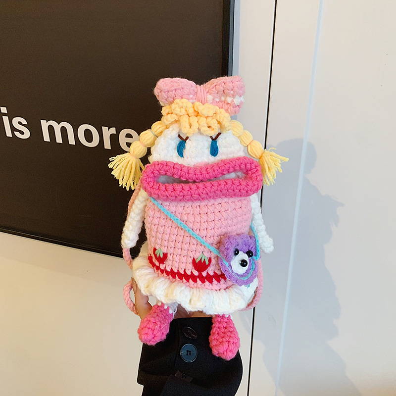 Bolsas para niños otoño y invierno nuevos lindos bolsas de lana coreanas tejidas a mano rosa gran boca bolsas de cambio de teléfono móvil