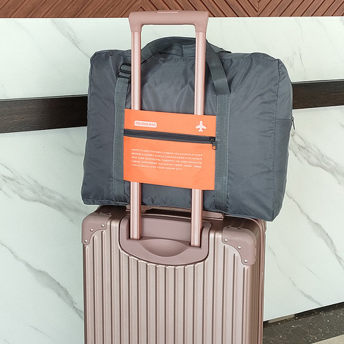 韩版可折叠行李包大容量生活用品拉杆收纳包 手提轻便男女旅行包
