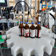 100ml西林瓶液体灌装机 不干胶贴标机 兽用水针剂灌装贴标生产线