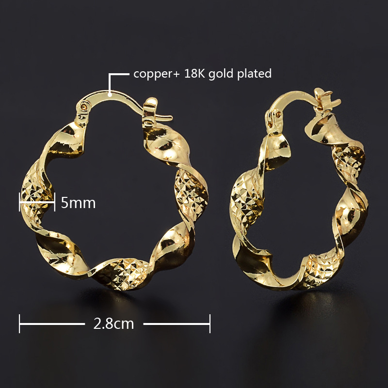 Orecchini donna a cerchio forma uovo in metallo lucido oro_voghion.com