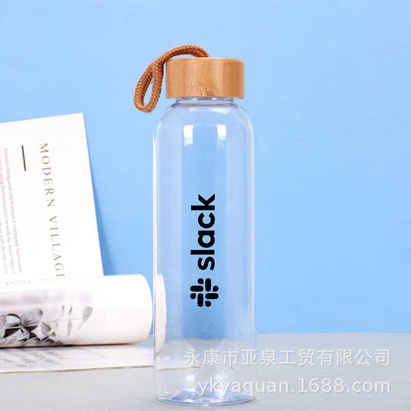 Suministro directo de fábrica Taza de vidrio con tapa de bambú transparente Taza de agua de vidrio de té de oficina de gran capacidad Taza de plástico transparente al por mayor