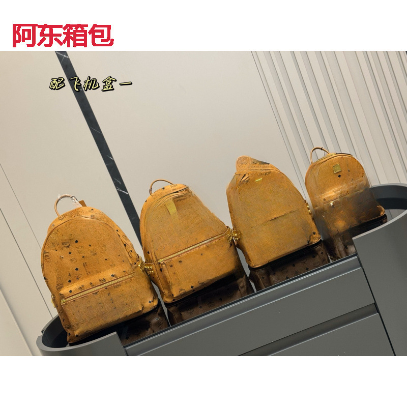 High-quality genuine leather MC brand bag, designer backpack with side rivets, student bag, mommy bag, travel bag High-quality genuine leather MC brand bag, designer backpack with side rivets, student bag, mommy bag, travel bag