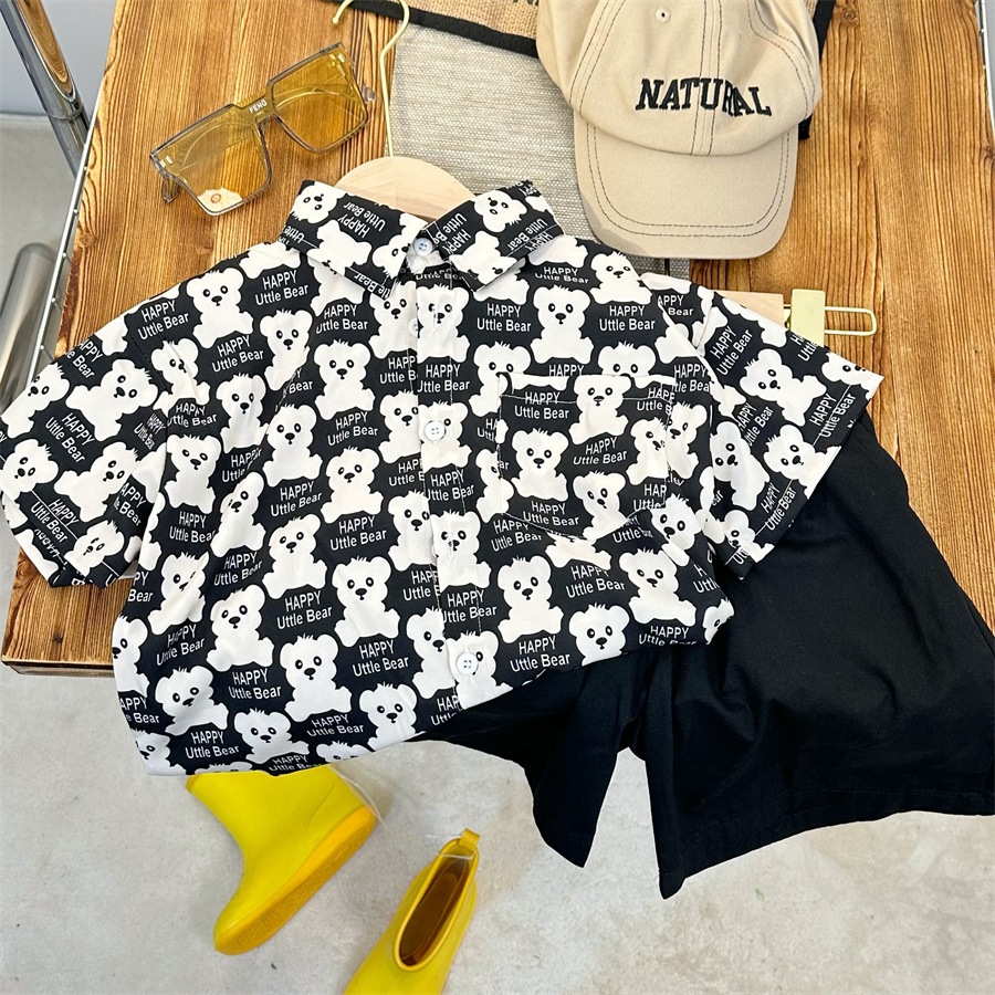 Camisa para niños 2024 verano hombres y mujeres niños feliz oso manga corta aire extranjero bebé flor camisa Joker ropa para niños