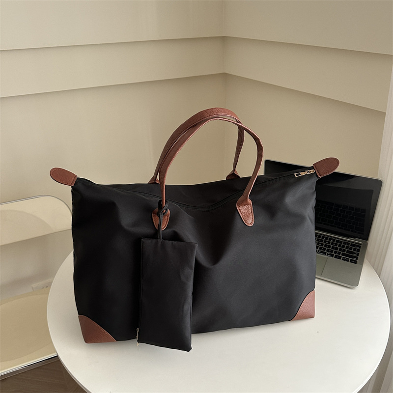 Bolsa de viaje para mujeres 2024 nueva sensación de alto nivel bolsas de bolsas de viajes portátiles bolsas de bolsas de moda de hombro de gran capacidad para mamá