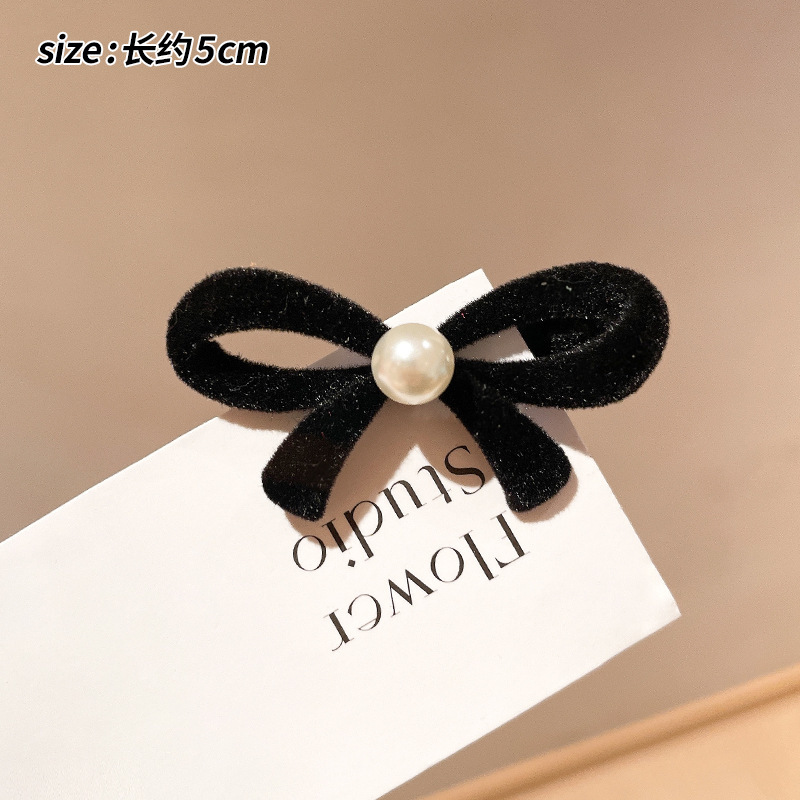 X1-053 black bow pearl side clip