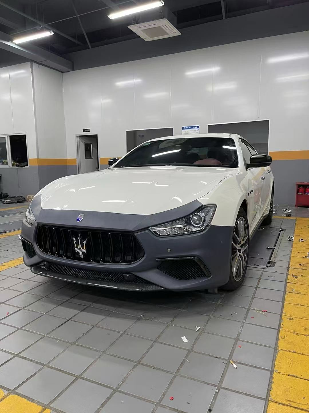 Maserati Ghibli Modified with Trofeo New Front Face Kit, Led Headlights, Tail Light Assembly, and Body Surround
