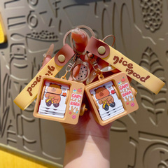 カピバラカピバラアニメーションページめくりキーホルダー女性クリエイティブ小さなおもちゃキーチェーンリング学生スクールバッグペンダント