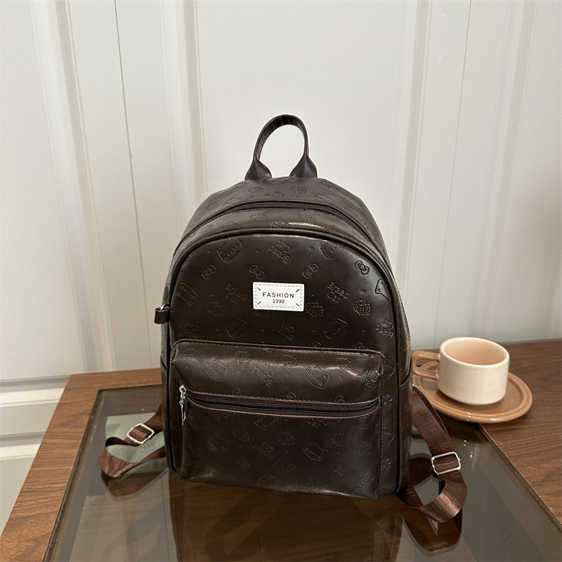 Mochila de nicho coreano para mujeres 2025 nueva moda retro ocio versátil mochila de viaje de estudiantes
