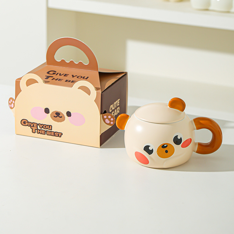 Taza de cerámica creativa de dibujos animados con tapa para desayuno casero de pareja de niños de alto valor de cara para acompañantes de regalo de taza