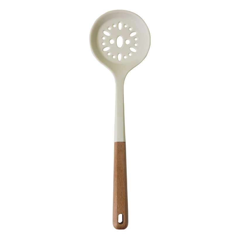 Cuchara de sopa de espátula de silicona transfronteriza Juego de 13 piezas de sartén antiadherente Pala de silicona de grado alimenticio Juego de utensilios de cocina de silicona blanca lechosa al por mayor