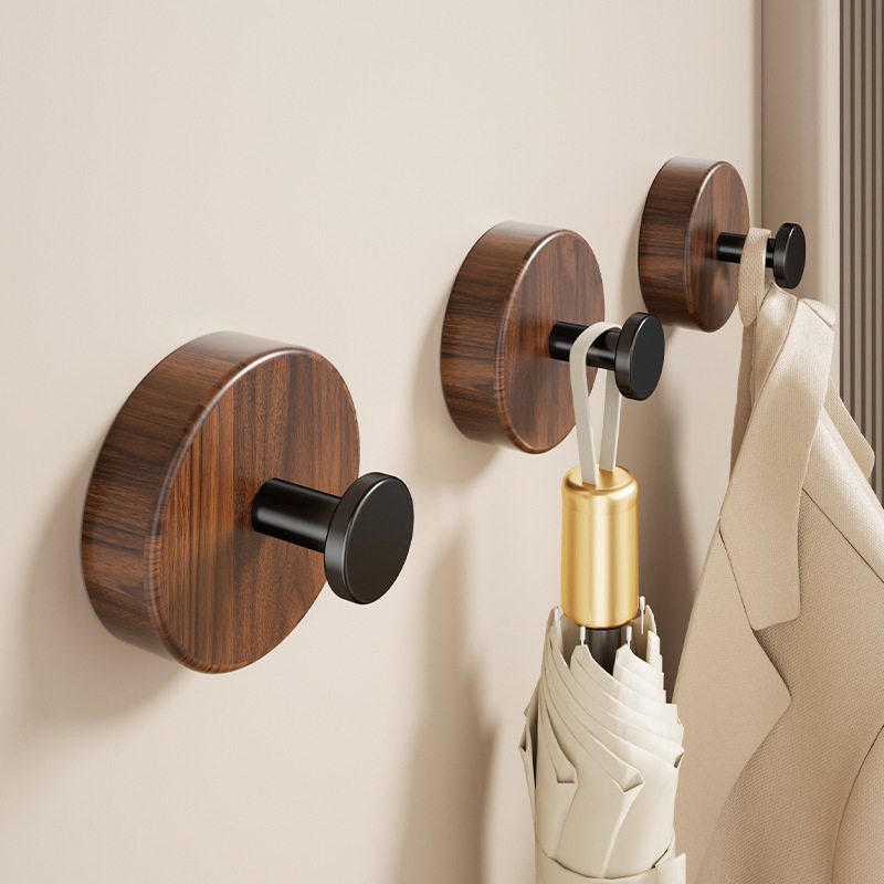Walnut wood hook, no drilling required, strong load-bearing, for hanging clothes behind the door in the kitchen, bathroom, or restroom Walnut wood hook, no drilling required, strong load-bearing, for hanging clothes behind the door in the kitchen, bathroom, or restroom