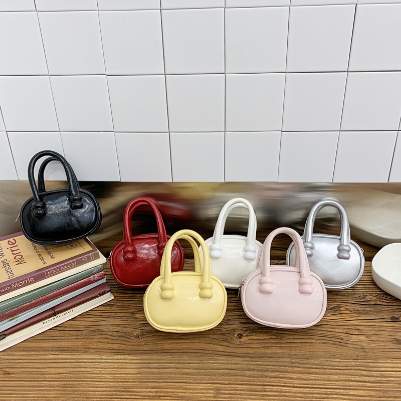 Moda coreana popular bolso de hombro para niñas simple bolso de bebé de color sólido bolso de bolso mini para niños